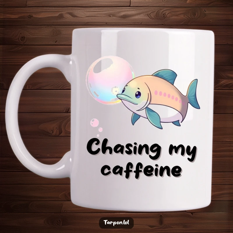 Funny Tarpon Bubble Chase Mug: A tarpon playfully pursues a shimmering, iridescent bubble with a determined yet happy expression.